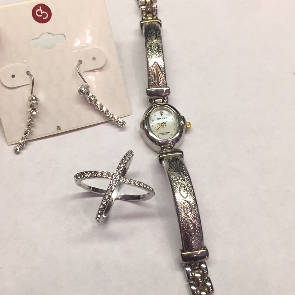 Watch, ring and earrings